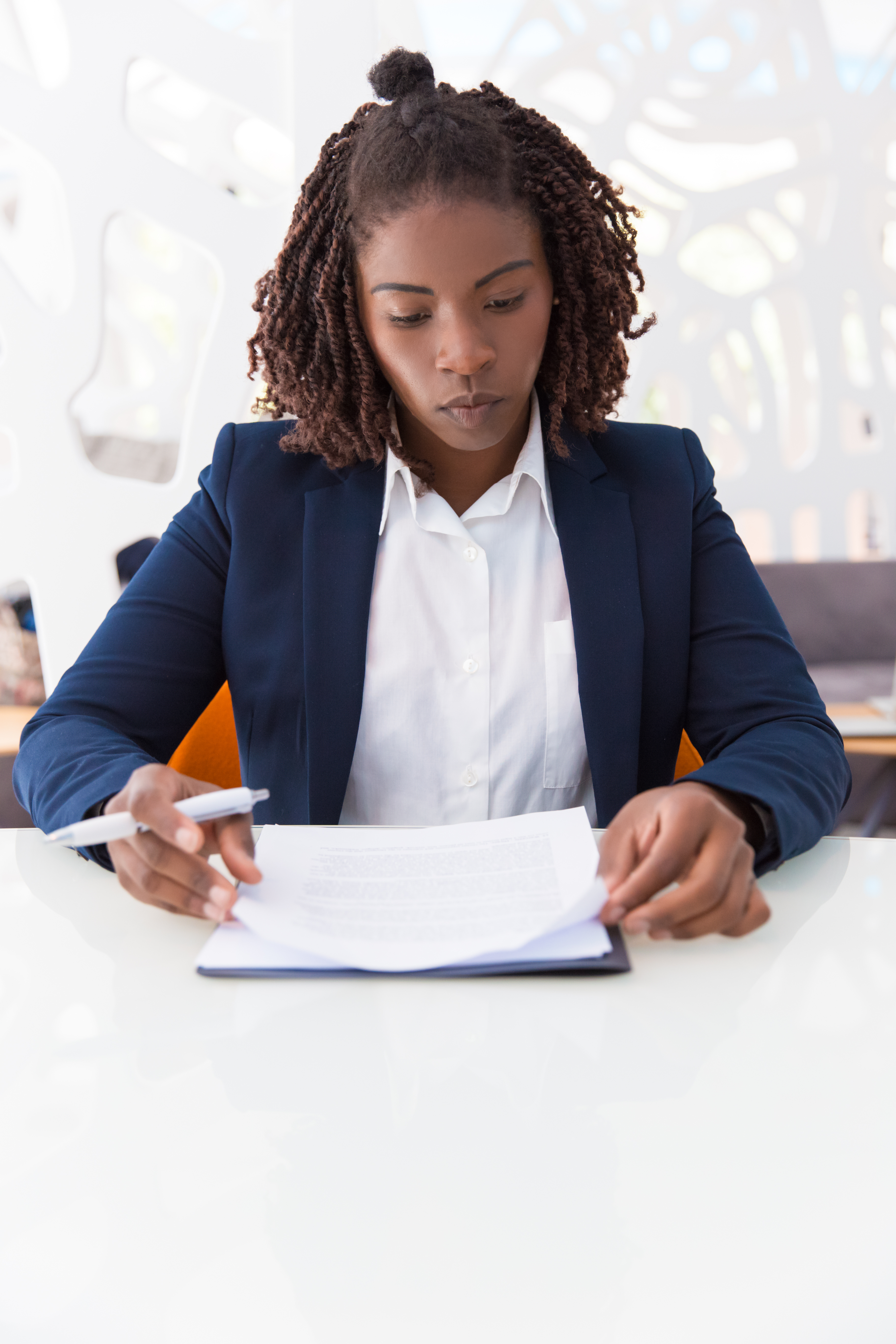 A small business owner reviewing his cash flow and financing options